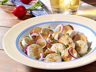 Rezept: Weißwurstsalat
